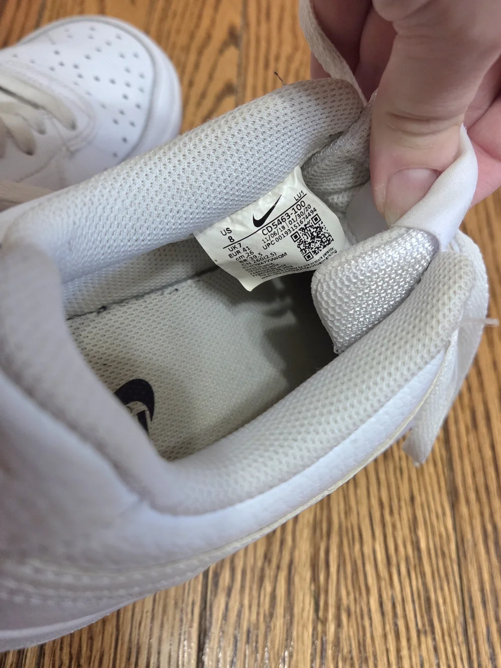 Nike Women’s Classic All-White Leather Court Vision Sneakers